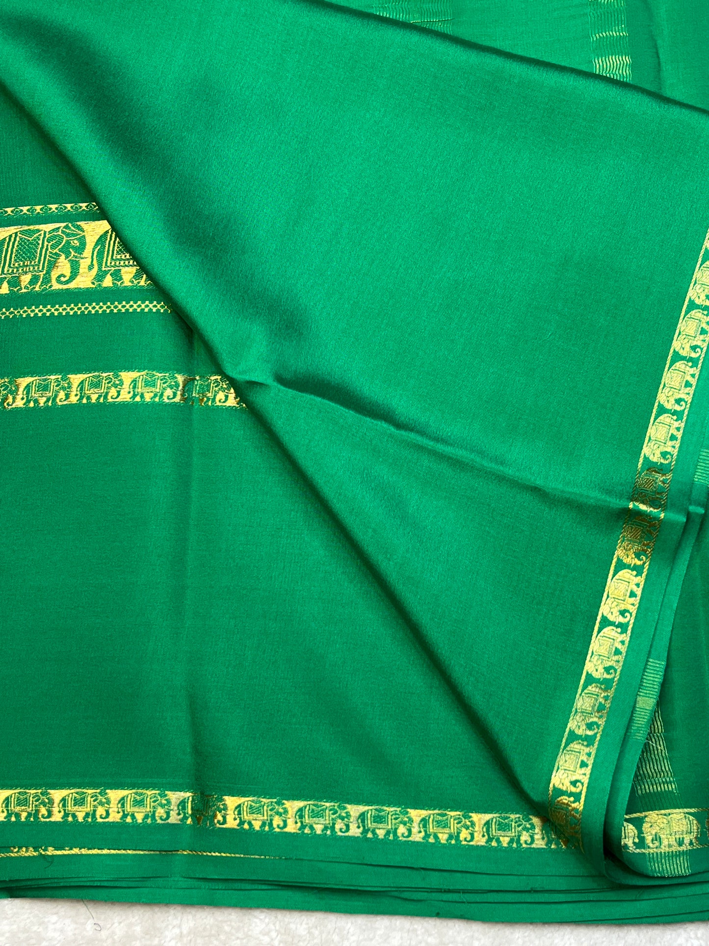 Pure Crepe Mysore Silk Saree with Bentex Elephant Border In Green Colour