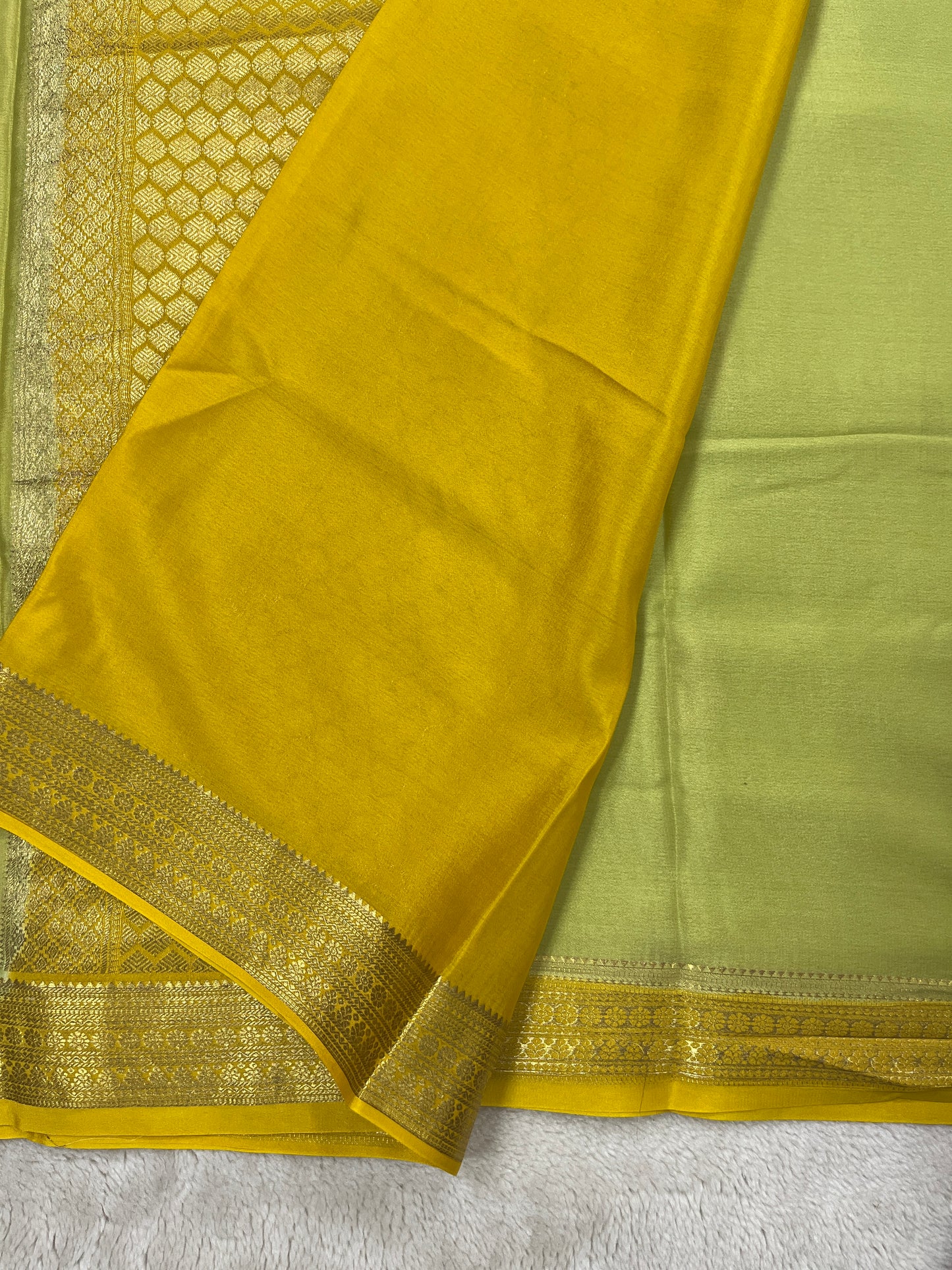 Pure Crepe Mysore Silk Saree with Butta In Green with Contrast Yellow Blouse
