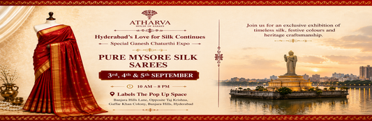 Atharva House of Sarees Ganesh Chaturthi Expo banner featuring a pure Mysore silk saree, festive heritage design, and Hyderabad’s Tank Bund Buddha statue.