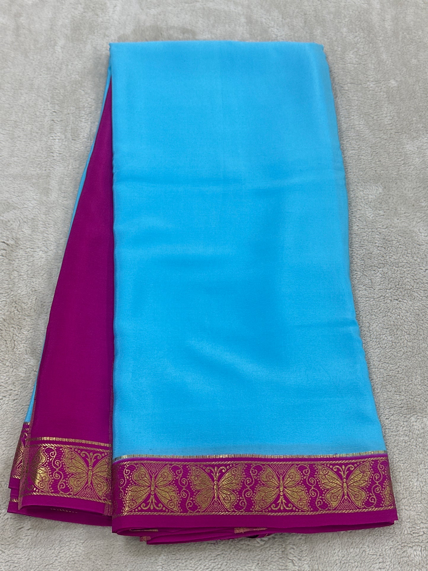 Silver Based Zari Pure Mysore silk in Butterfly Border