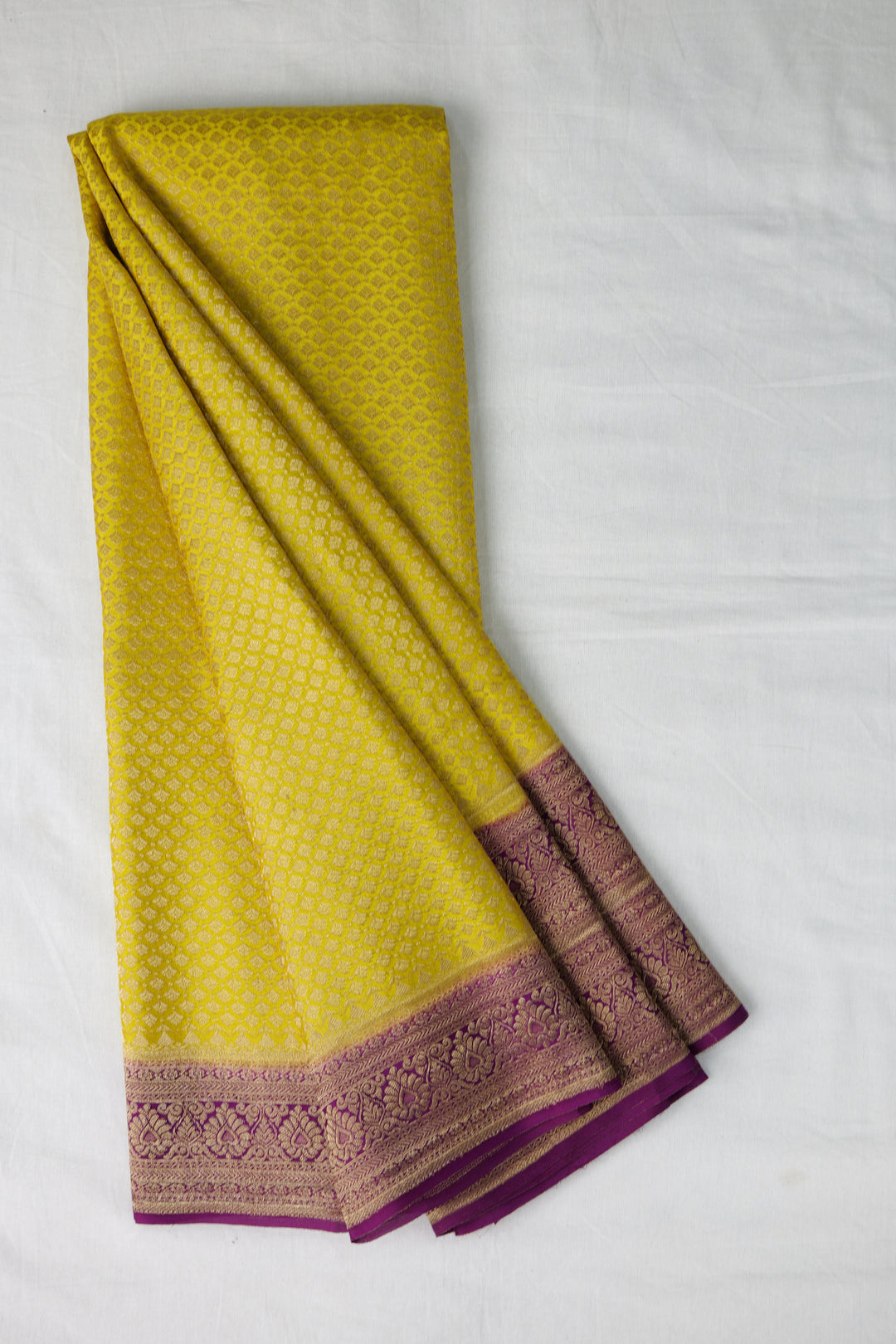 PURE MYSORE SILK SAREE IN RADIANT YELLOW WITH BROCADE DETAILING AND CONTRAST BORDER 