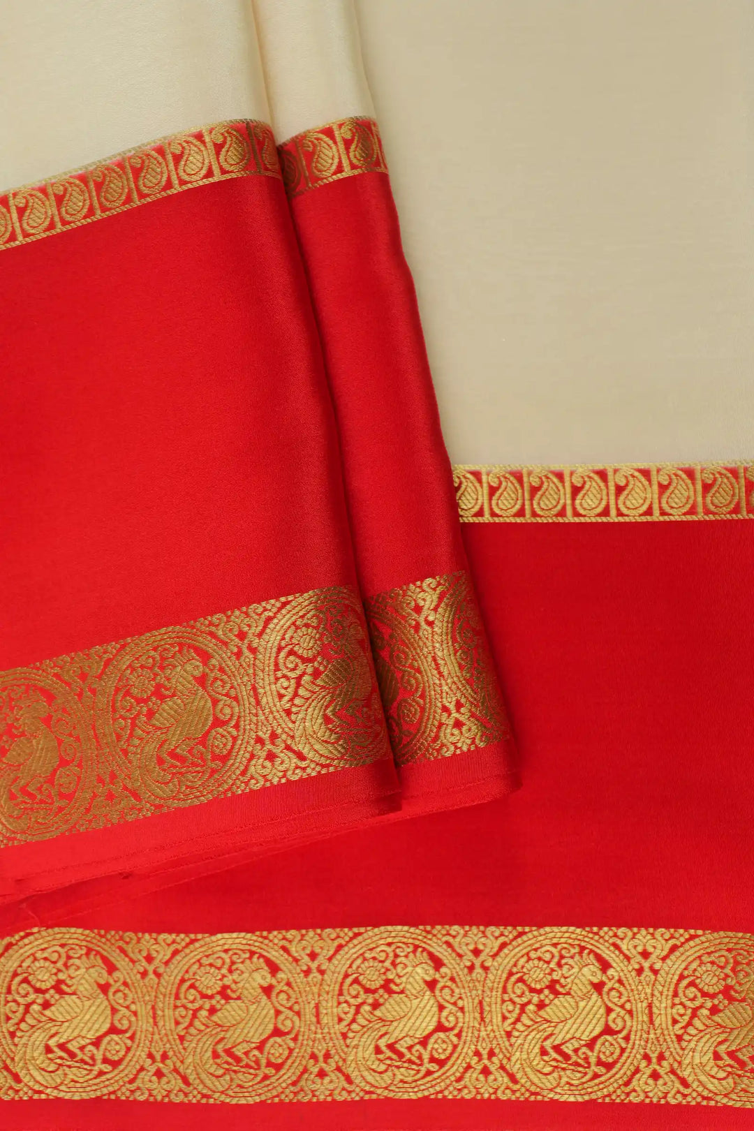 Beige Mysore Silk Saree featuring red and gold woven border