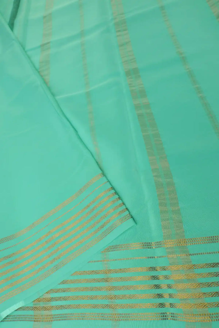 Black saree with green border