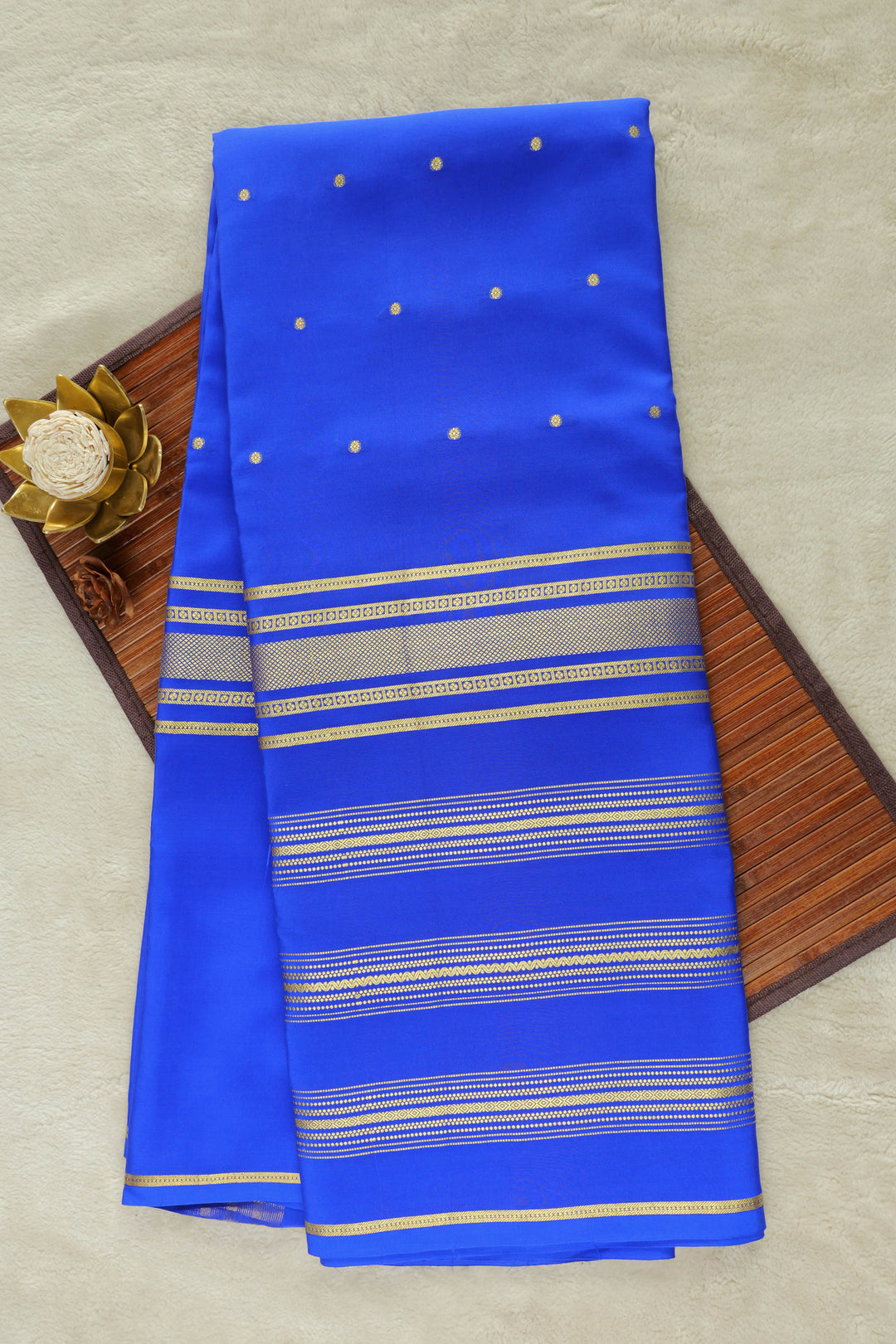 Blue Mysore silk saree with golden zari border and striped pallu
