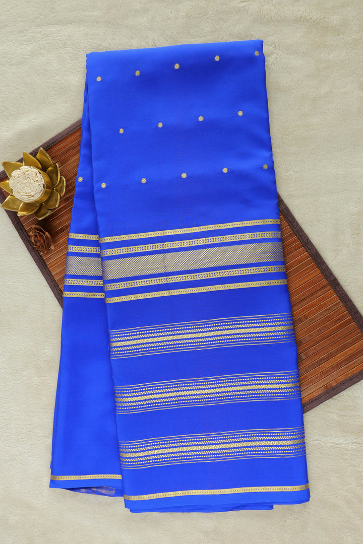 Blue Mysore silk saree with golden zari border and striped pallu