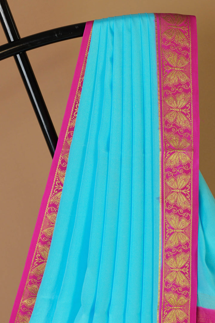 Blue crepe Mysore silk saree with bright pink border – Atharva

