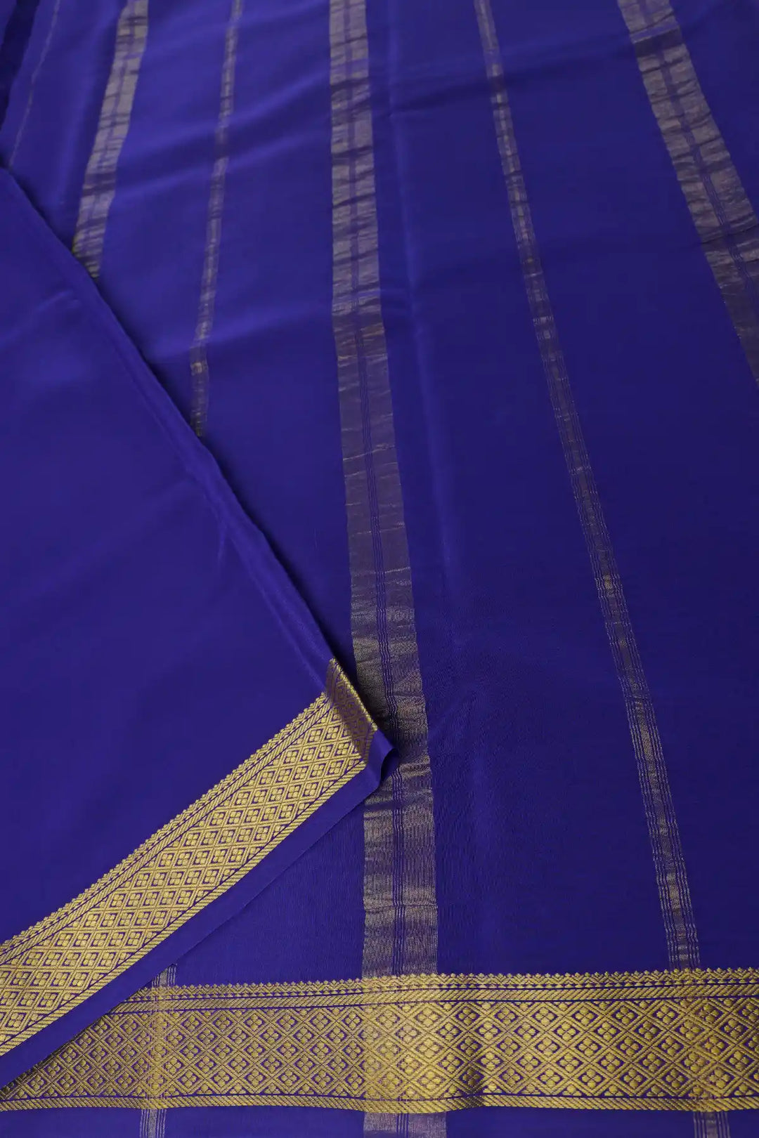 Bright pink mysore silk saree with purple gold border