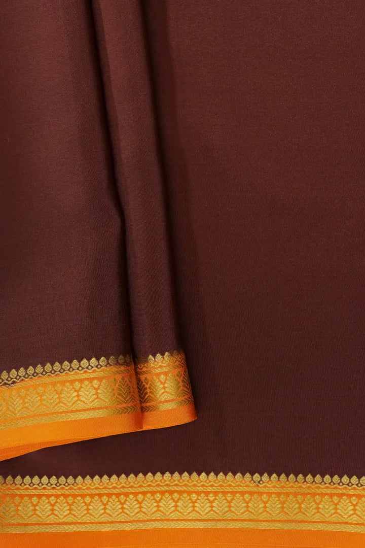 Brown Mysore silk saree with orange pallu and gold zari border
