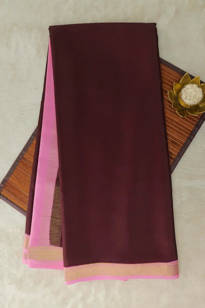 Brown Mysore silk saree with pink border and gold zari