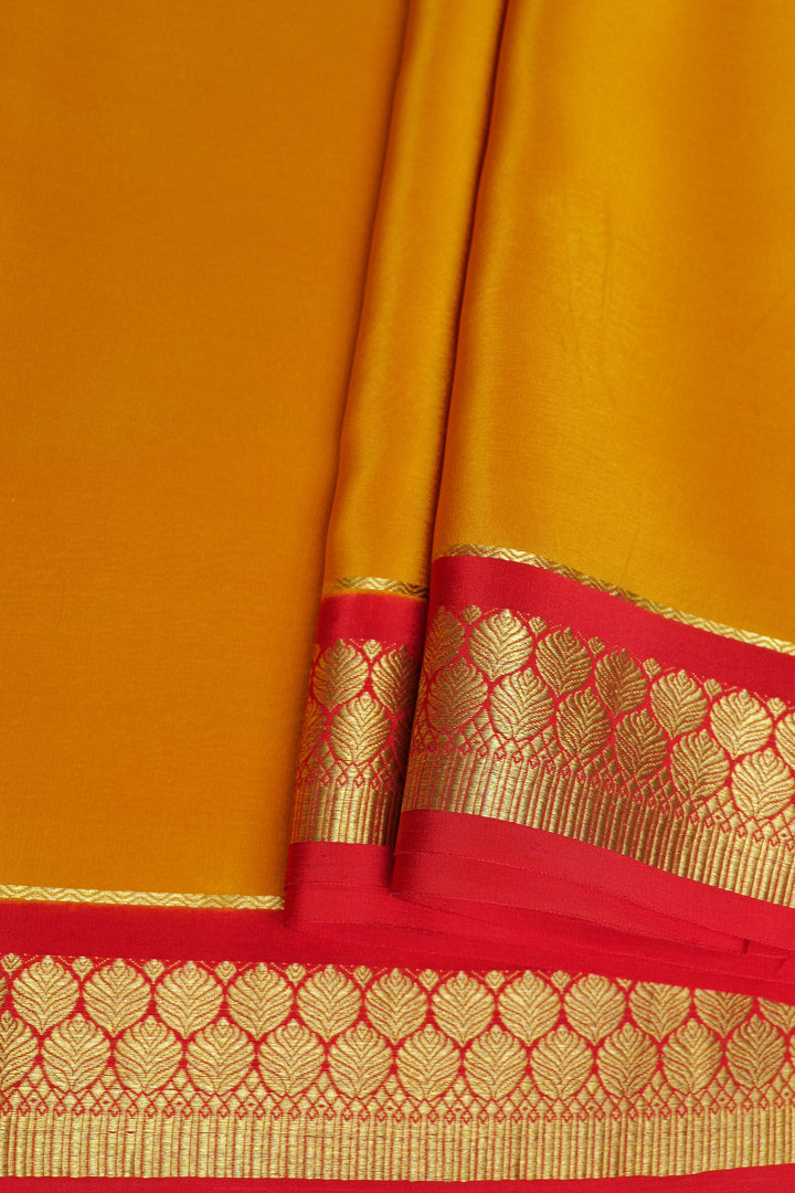 Contrast Red bordered yellow Mysore Crepe silk saree