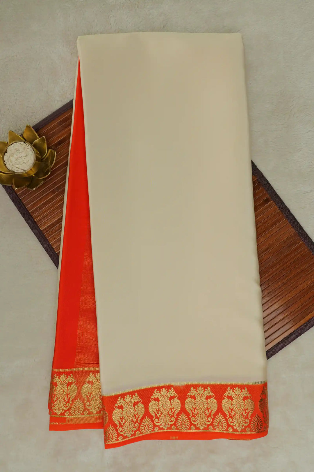Cream Mysore Silk Saree with Orange Border and Gandaberunda Design