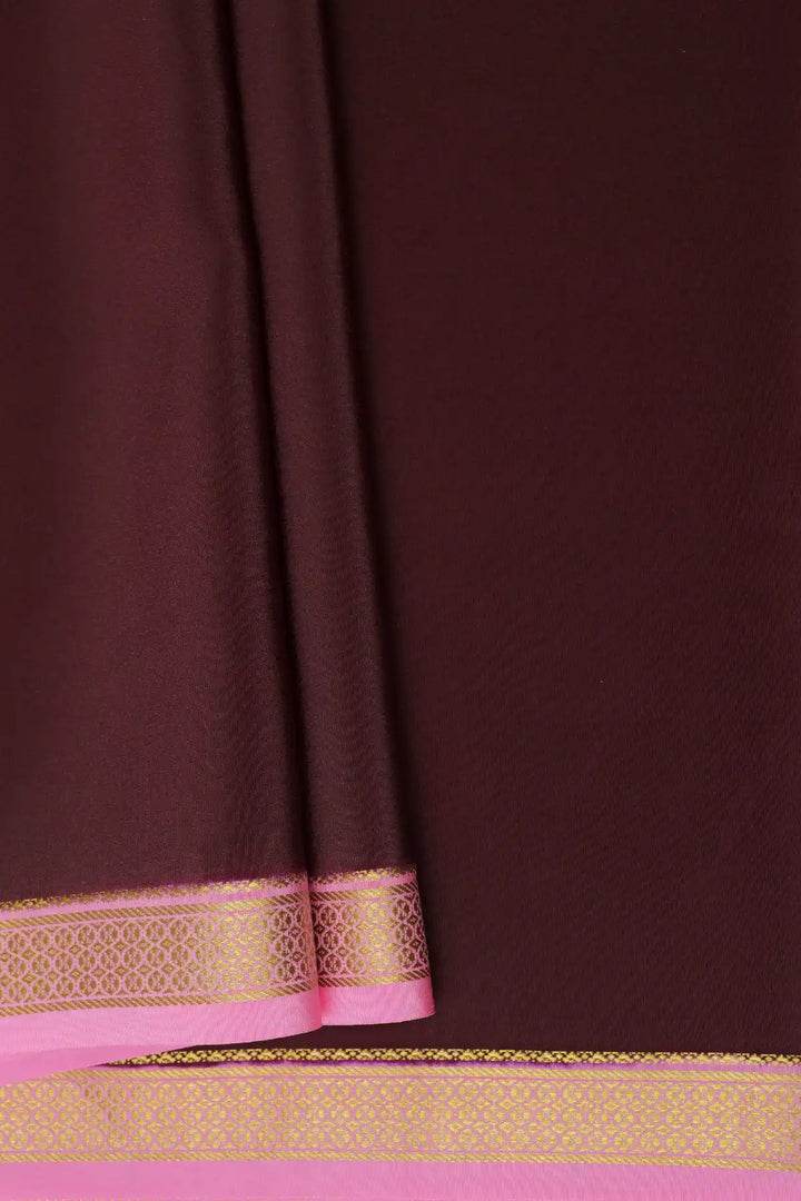 Dark brown silk saree with pink contrast border