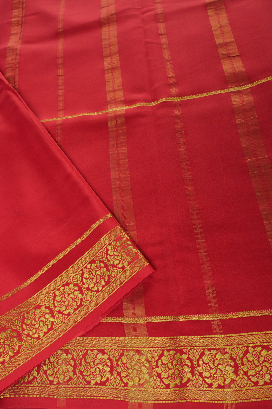 Dark green Mysore silk saree with red Pallu