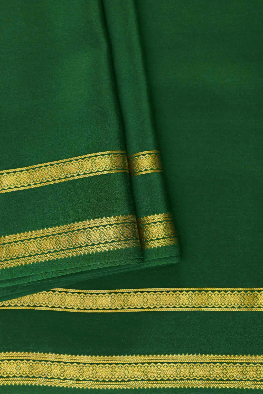 Dark green and gold Mysore Silk Saree with gold detailing