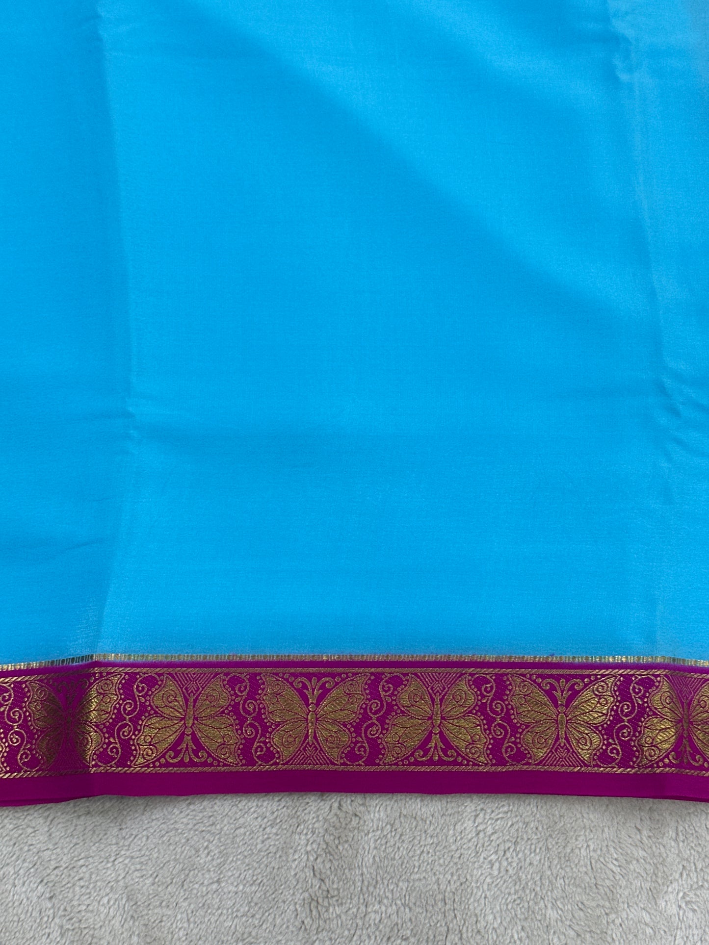 Silver Based Zari Pure Mysore silk in Butterfly Border