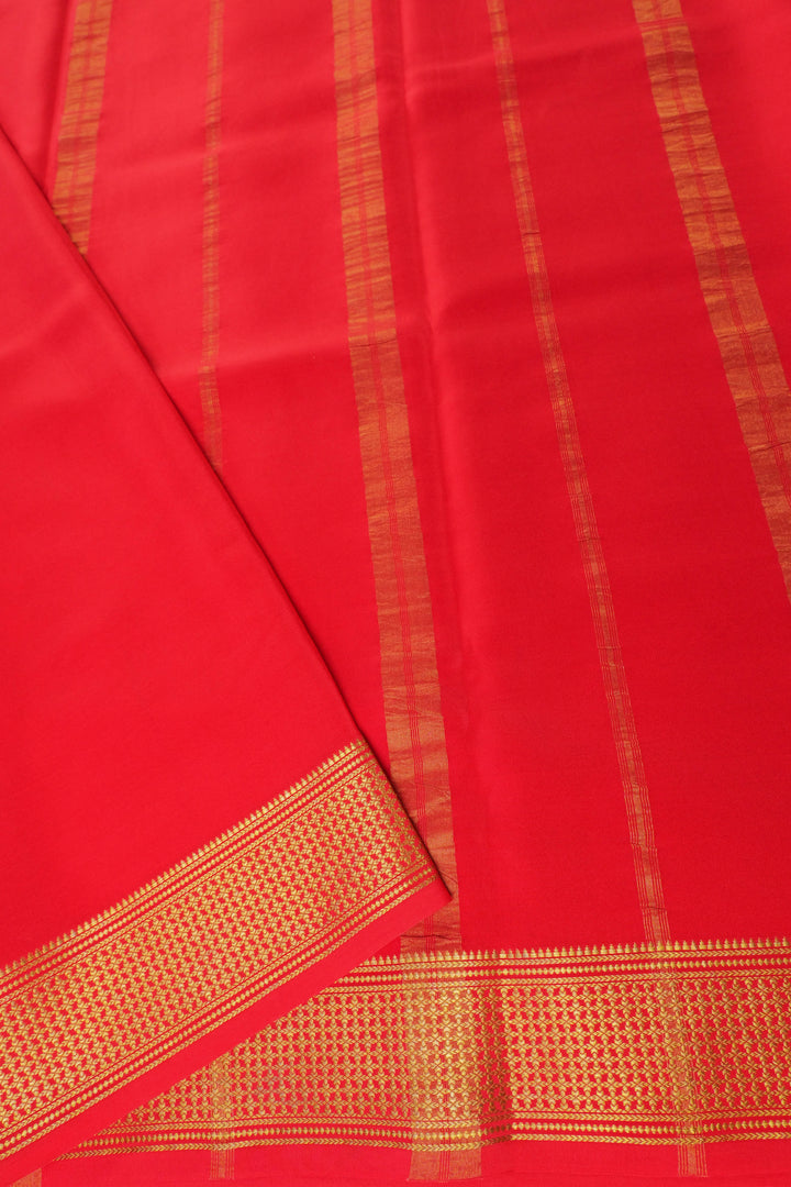 Gold zari bordered pink Mysore silk saree