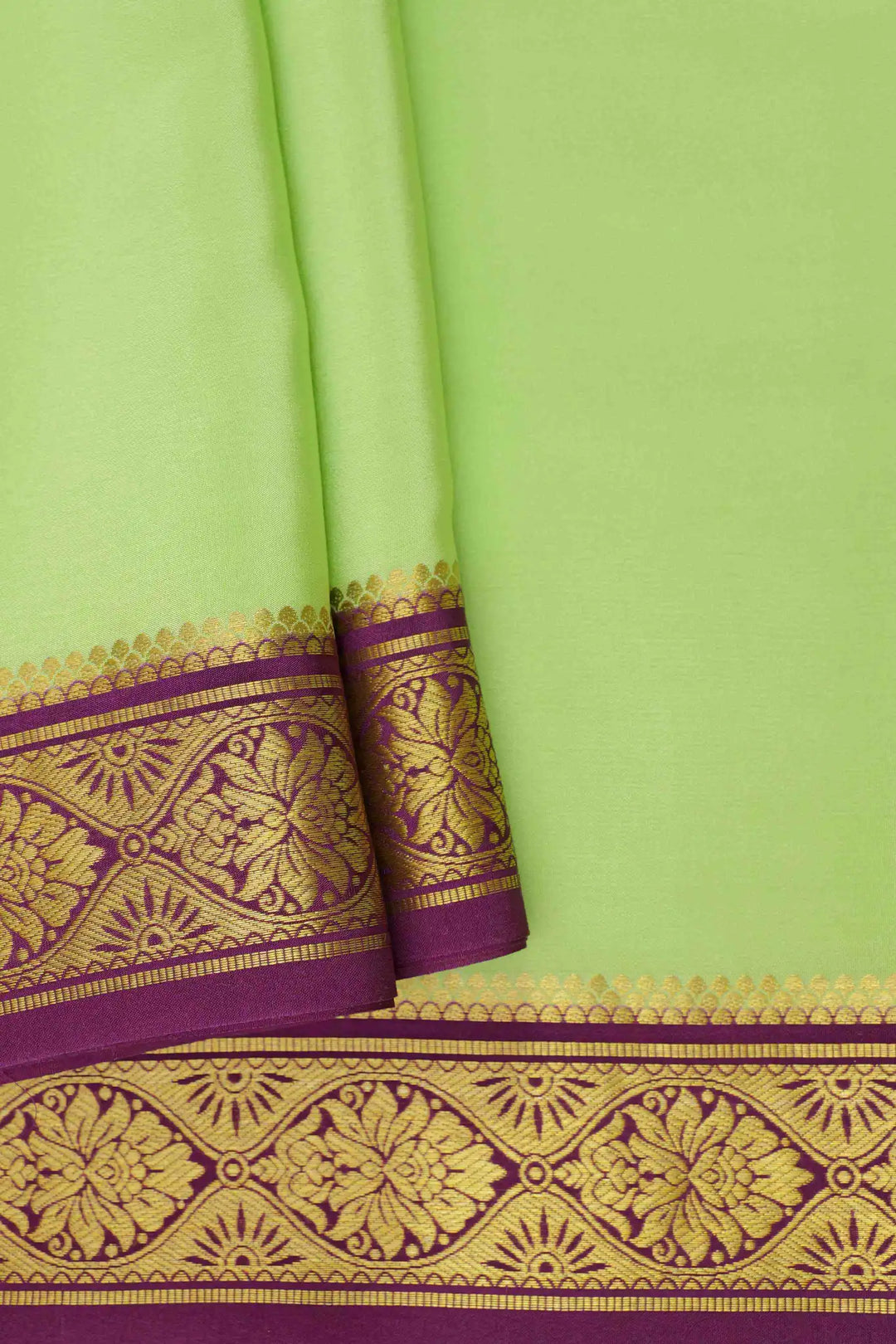Green Mysore Silk Saree with purple detailing and gold border