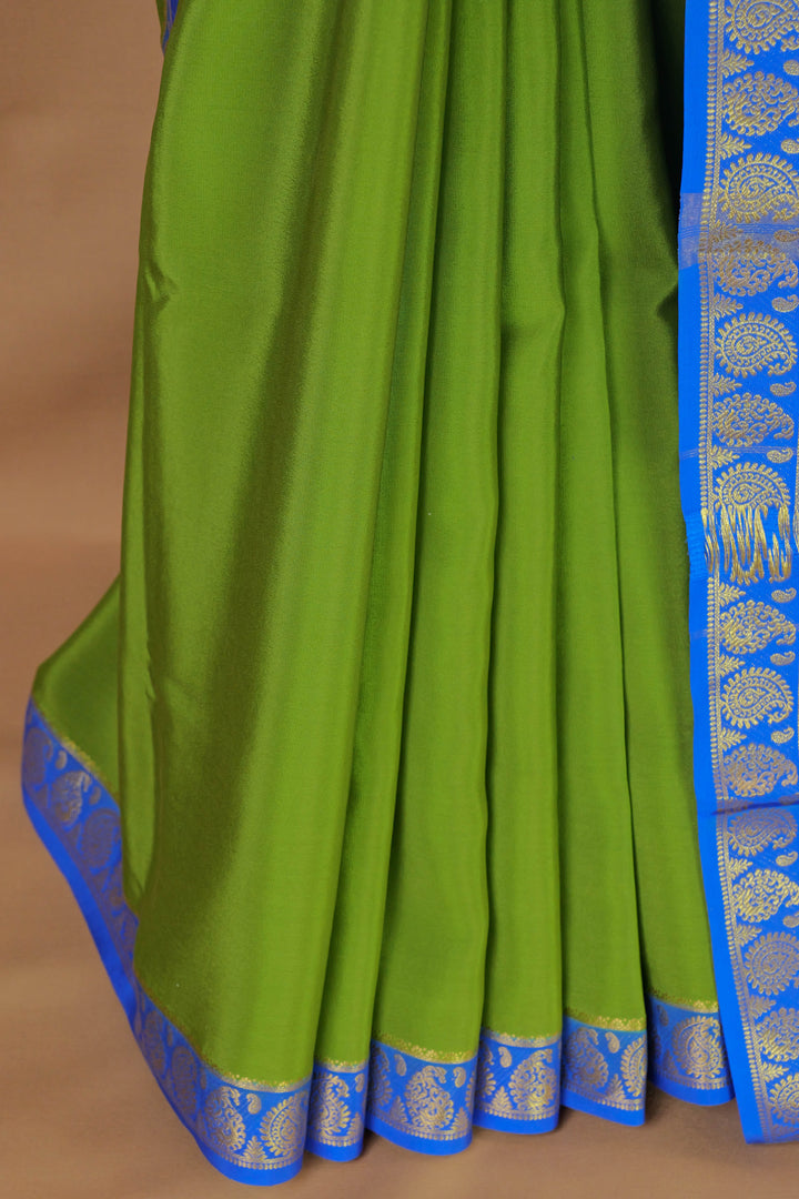 Green Mysore crepe silk saree with Contrast royal blue border – Atharva