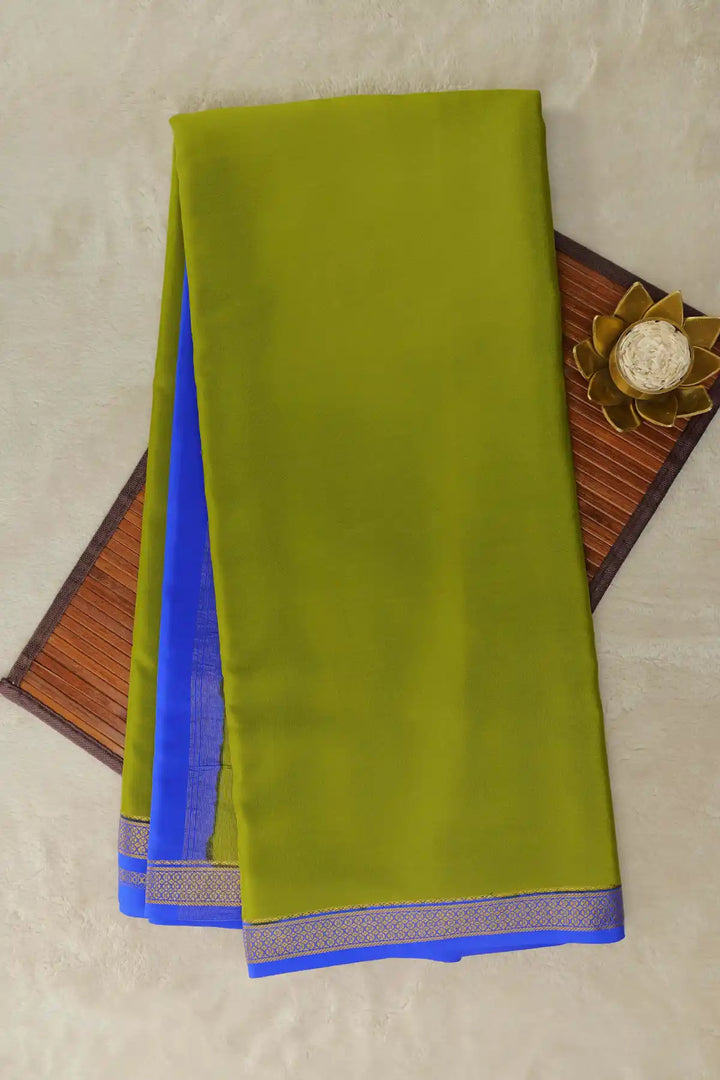 Green Mysore silk saree with blue border and gold zari