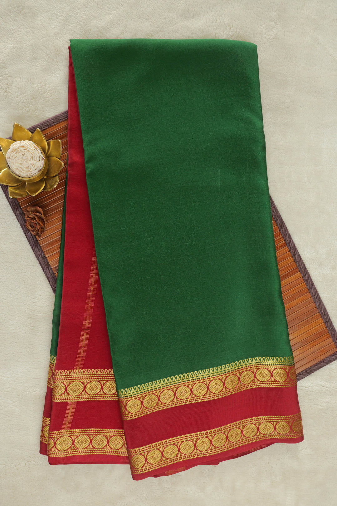 Green Mysore silk saree with vibrant red and gold zari