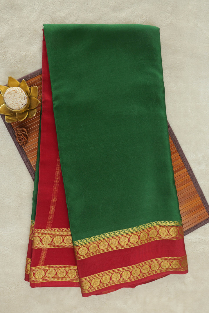 Green Mysore silk saree with vibrant red and gold zari