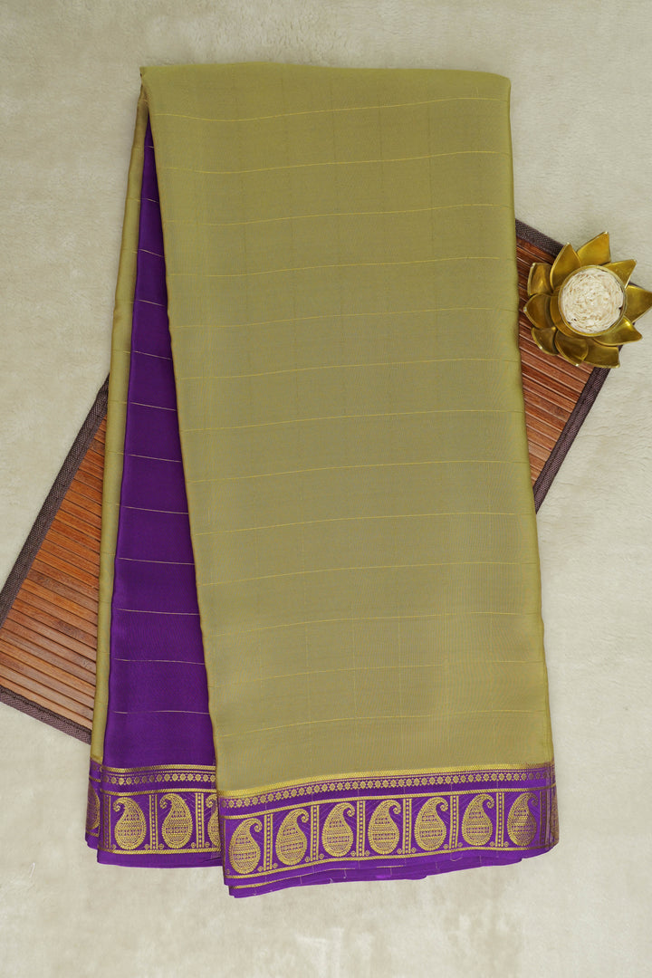 Green and purple Mysore silk saree with gold stripes and mango border