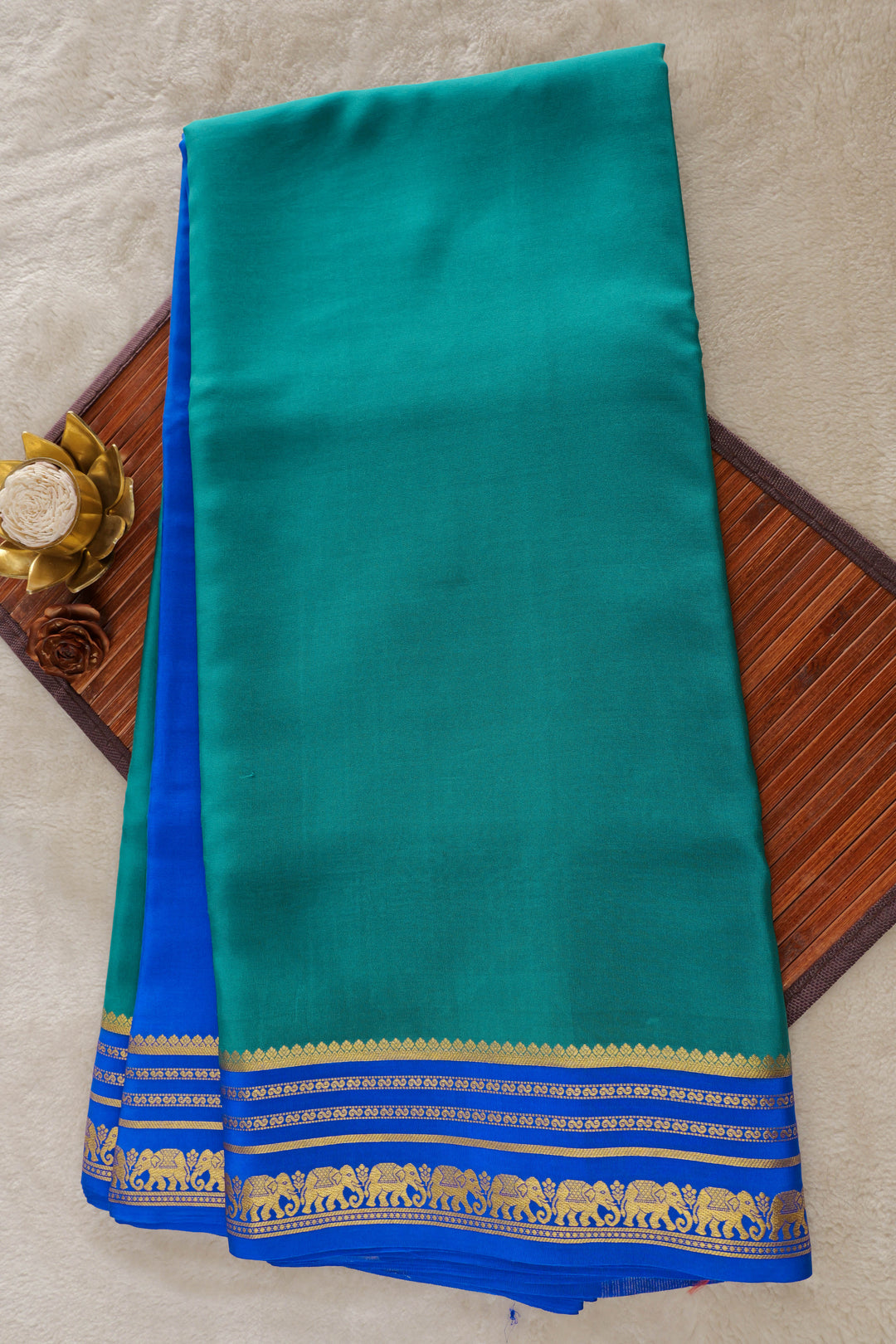 Green and royal blue Mysore silk saree with intricate gold zari border