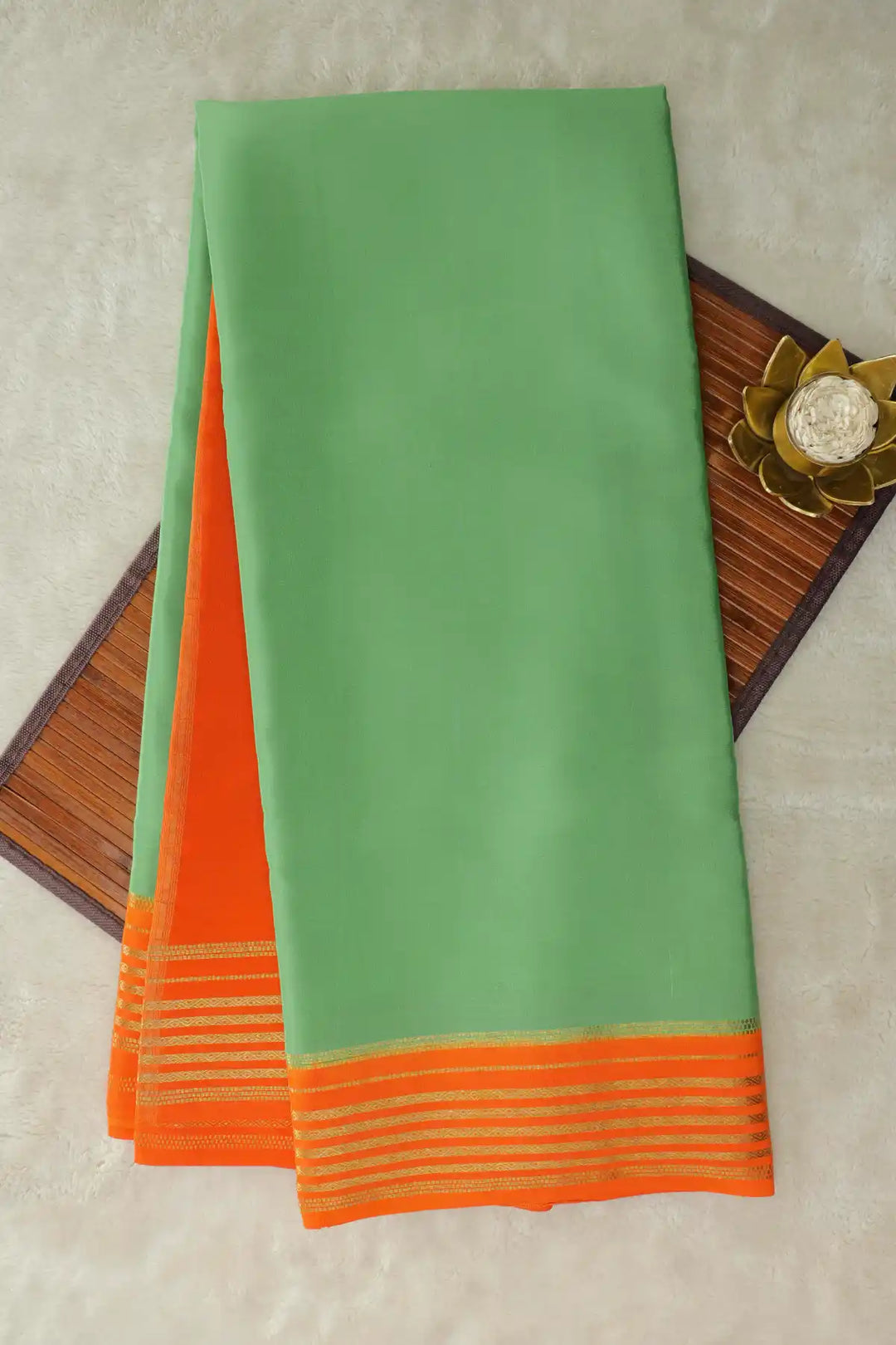 Green saree with orange border