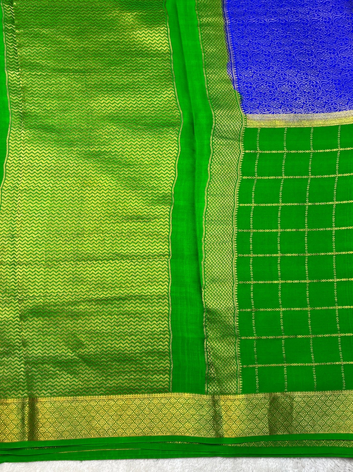 Pure Crepe Mysore Silk Saree In Shaded Mix Checks Royal Blue With Green Contrast Blouse