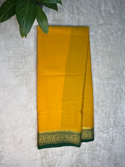 Pure Crepe Mysore Silk Saree plain in Yellow with contrast Green Blouse