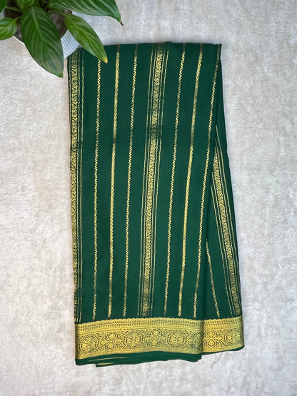 Pure Crepe Mysore Silk Saree with gold stripes border In Green Colour