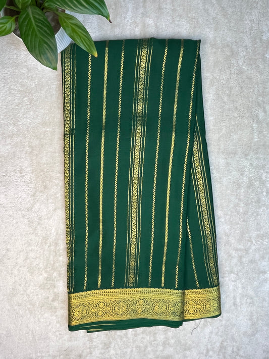 Pure Crepe Mysore Silk Saree with gold stripes border In Green Colour