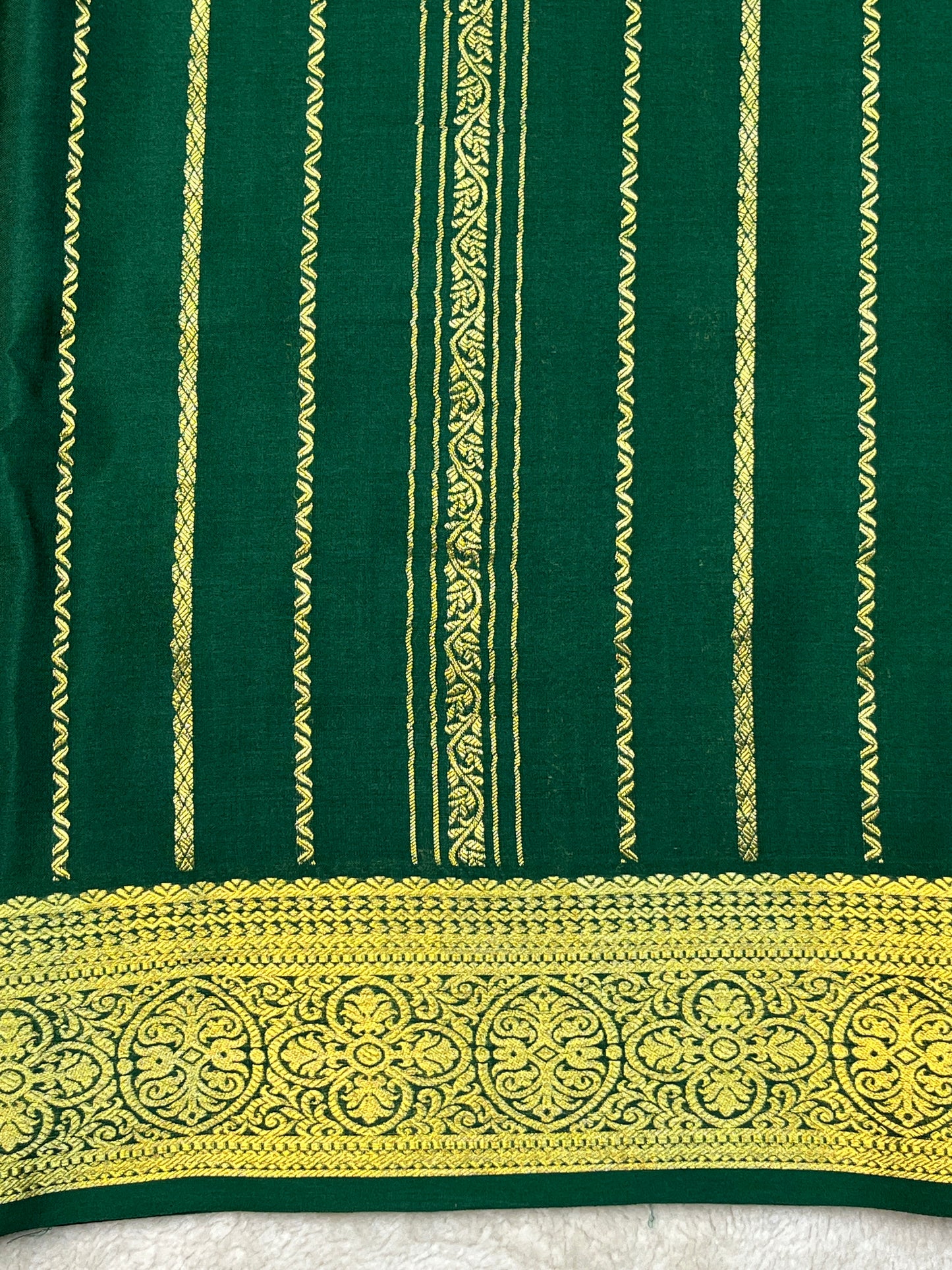 Pure Crepe Mysore Silk Saree with gold stripes border In Green Colour