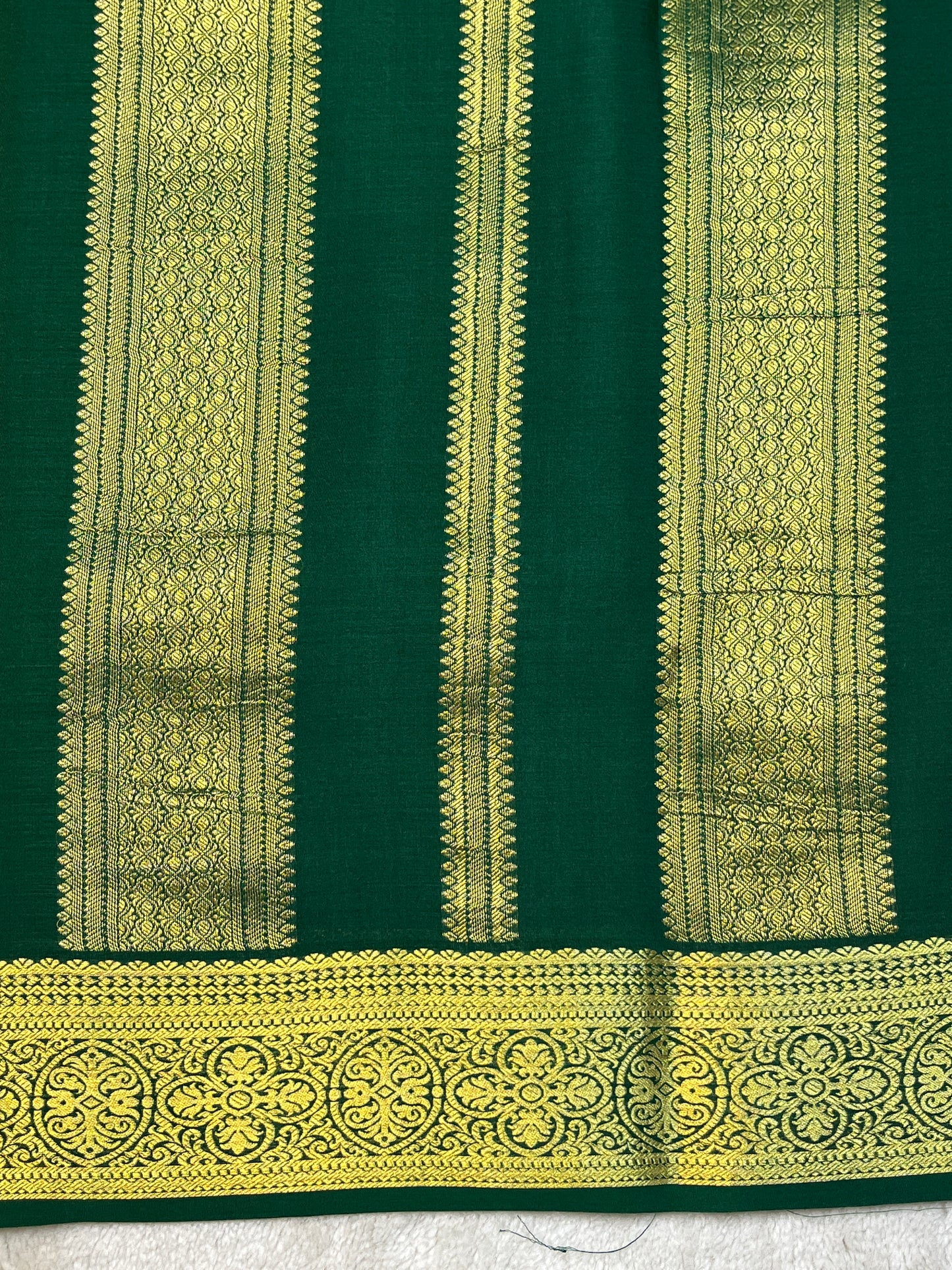 Pure Crepe Mysore Silk Saree with gold stripes border In Green Colour
