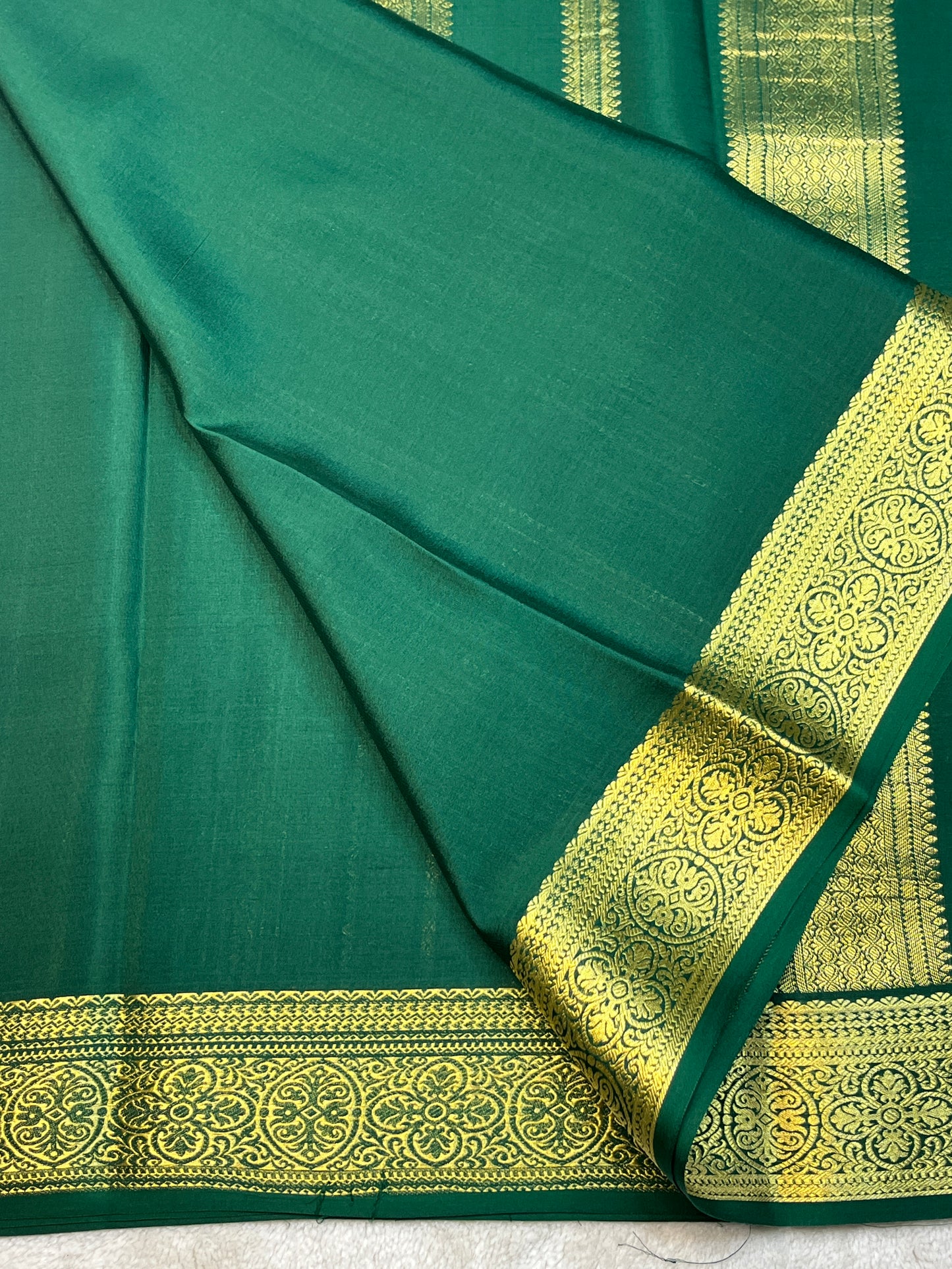 Pure Crepe Mysore Silk Saree with gold stripes border In Green Colour