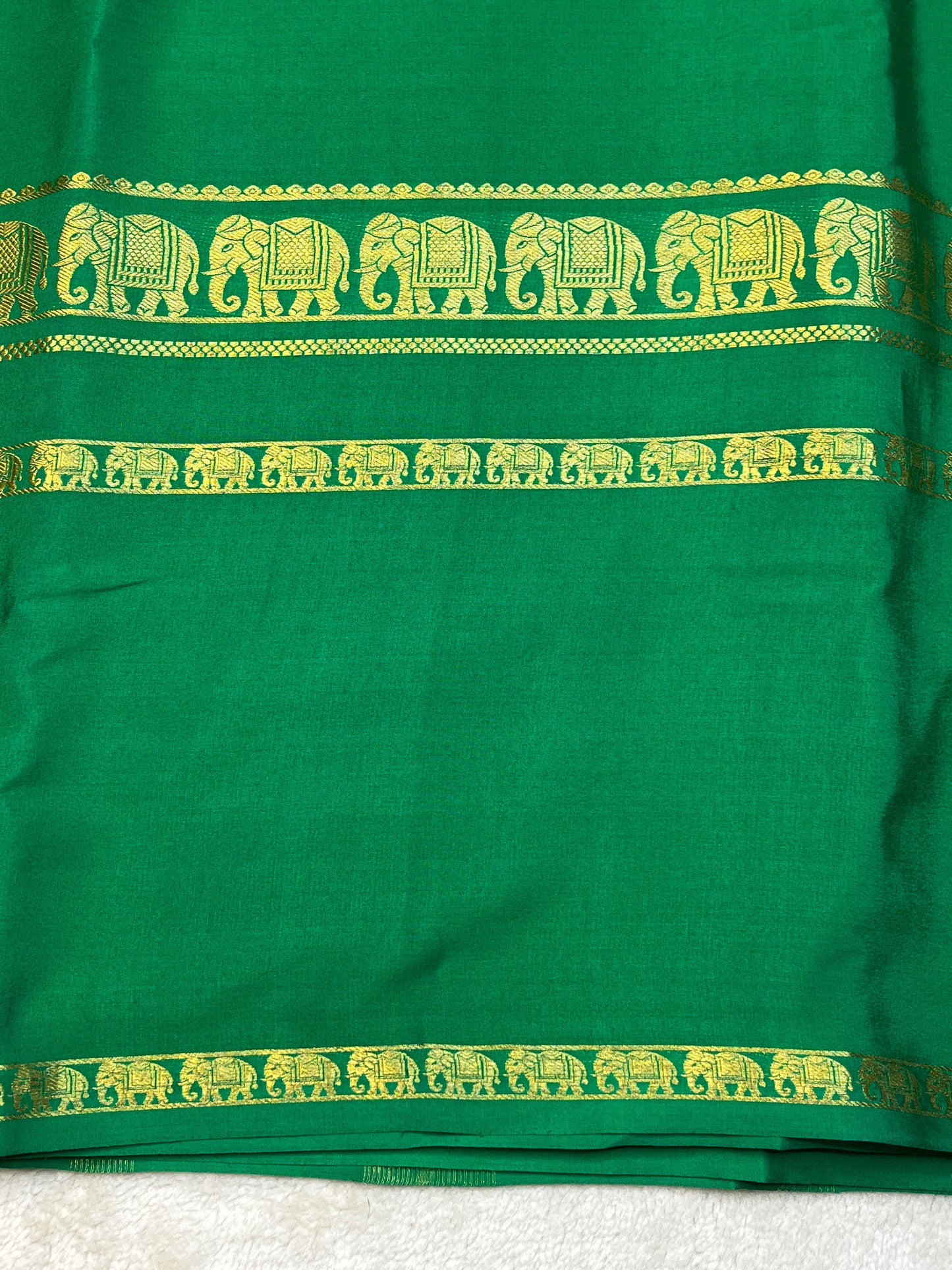 Pure Crepe Mysore Silk Saree with Bentex Elephant Border In Green Colour