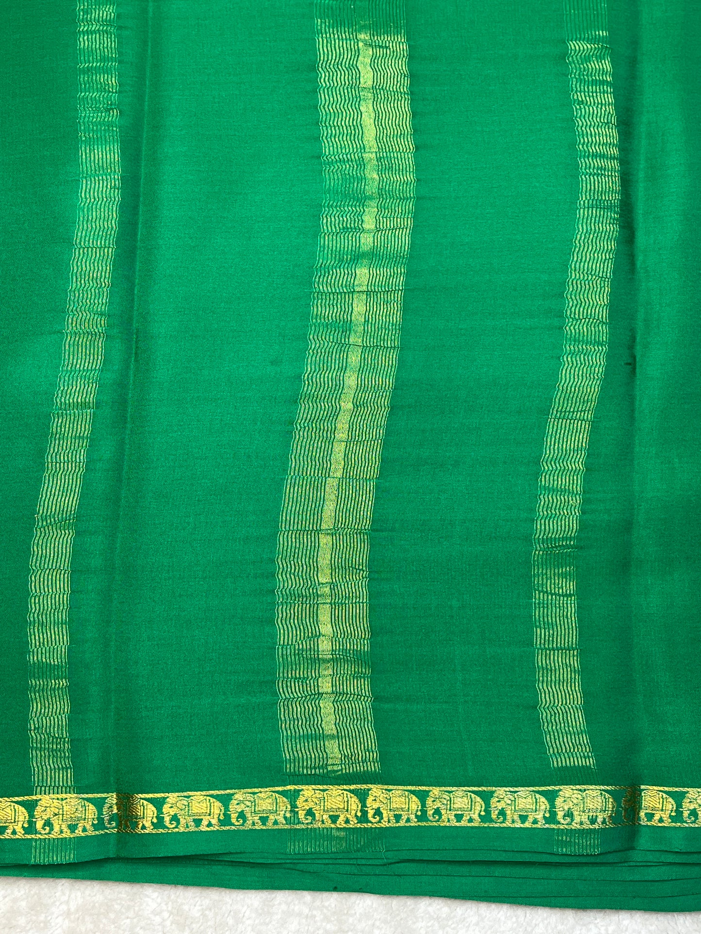 Pure Crepe Mysore Silk Saree with Bentex Elephant Border In Green Colour