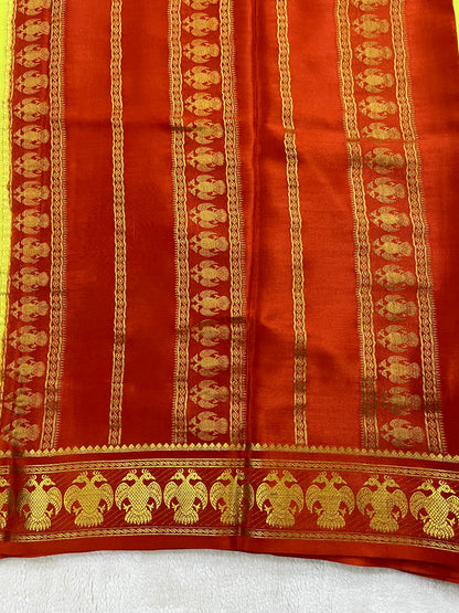 Pure Crepe Mysore Silk with Gandaberunda Pattern In Green with Contrast Red Blouse
