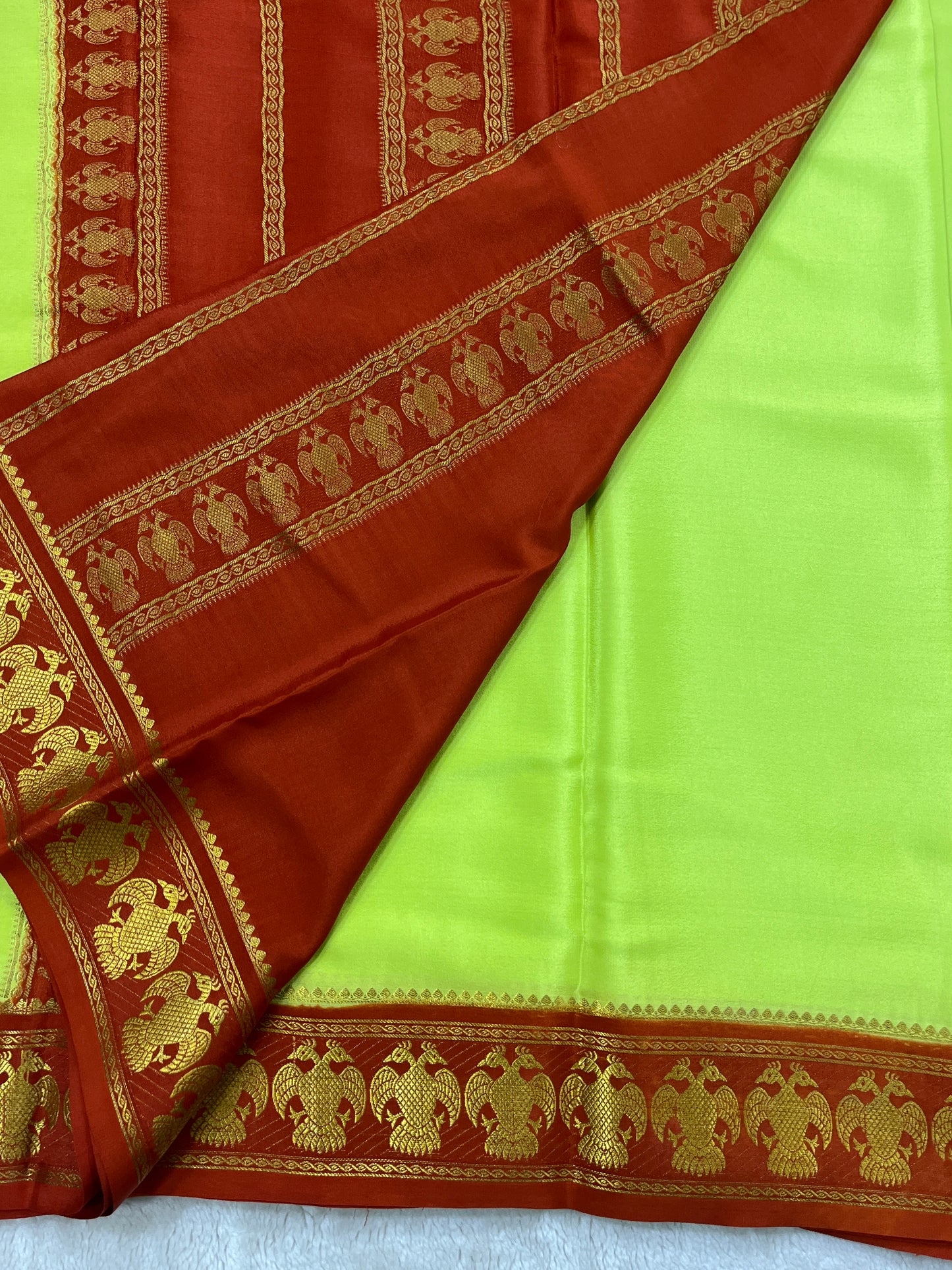 Pure Crepe Mysore Silk with Gandaberunda Pattern In Green with Contrast Red Blouse