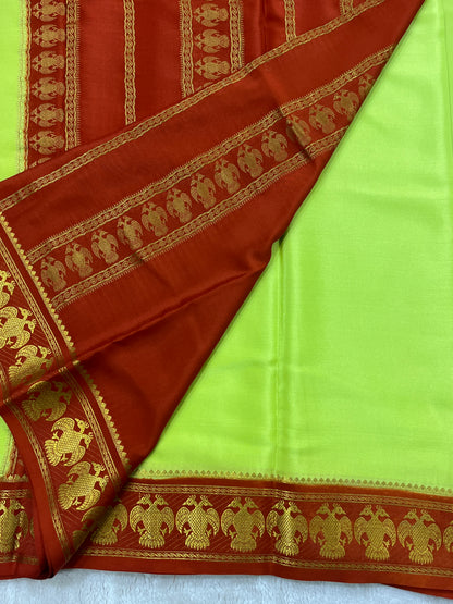 Pure Crepe Mysore Silk with Gandaberunda Pattern In Green with Contrast Red Blouse