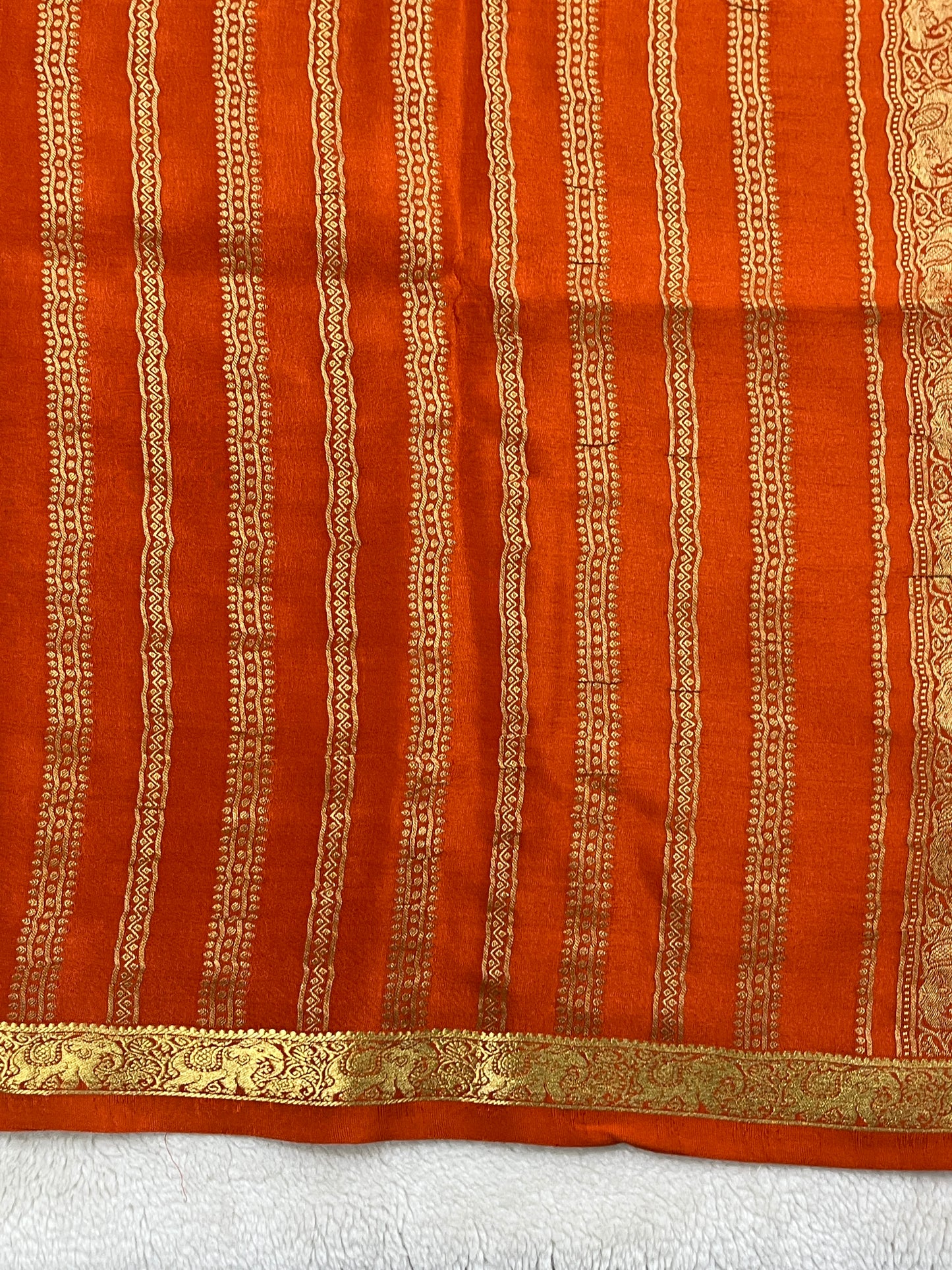 Pure Crepe Mysore Silk Saree Elephant Butta In Orange With Self Blouse