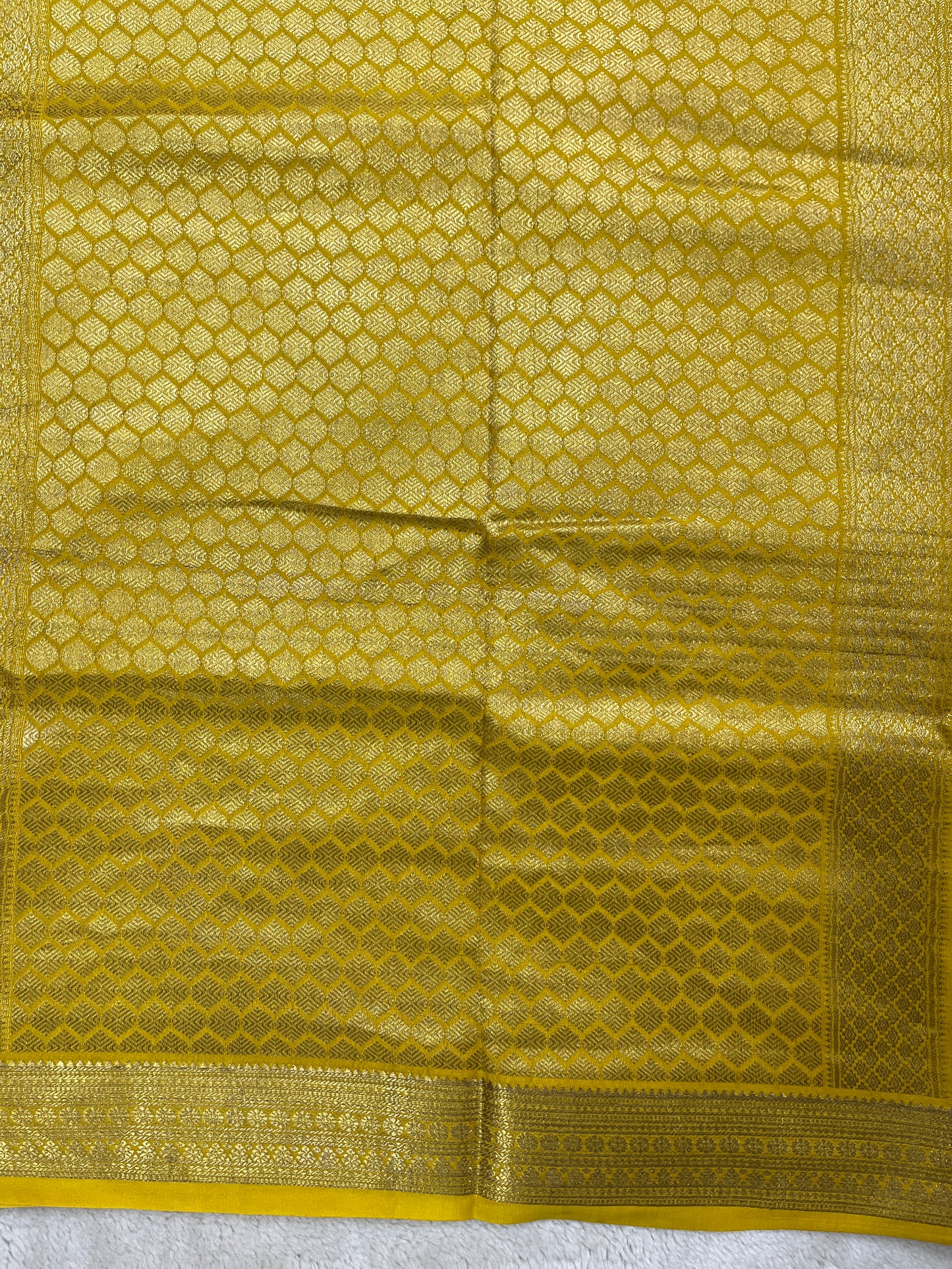 Pure Crepe Mysore Silk Saree with Butta In Green with Contrast Yellow Blouse