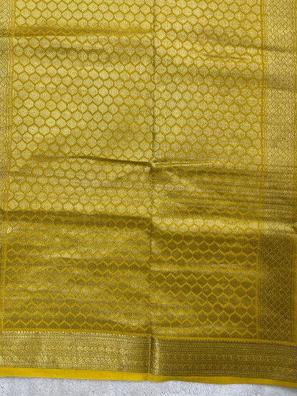Pure Crepe Mysore Silk Saree with Butta In Green with Contrast Yellow Blouse