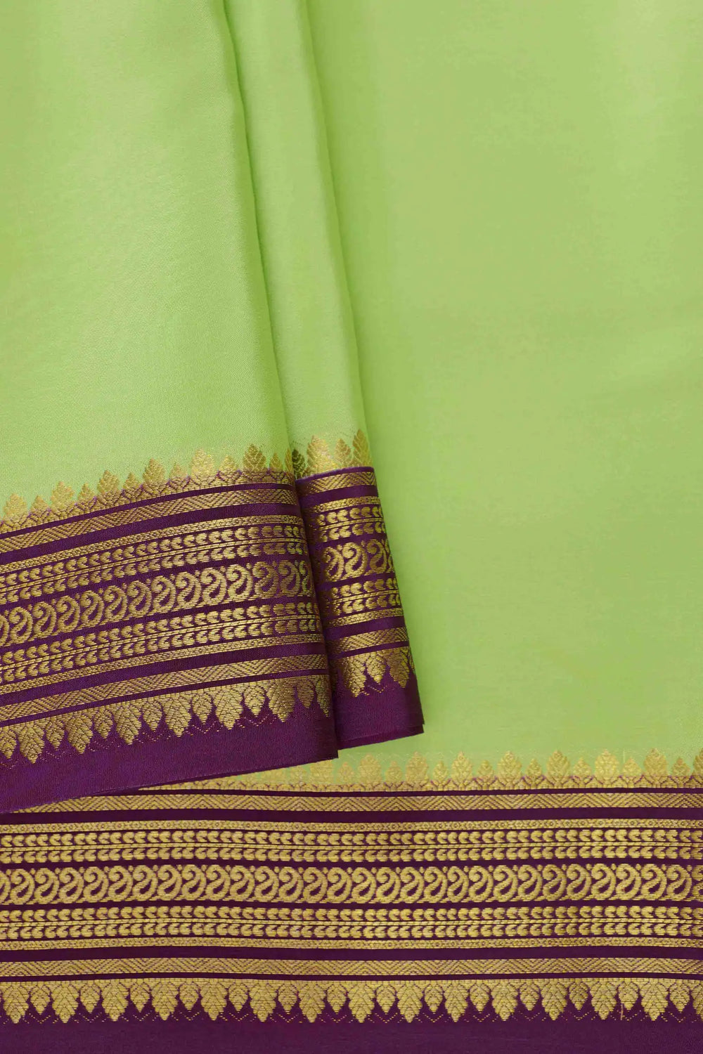 Light green Mysore Silk Saree with a contrasting purple zari border