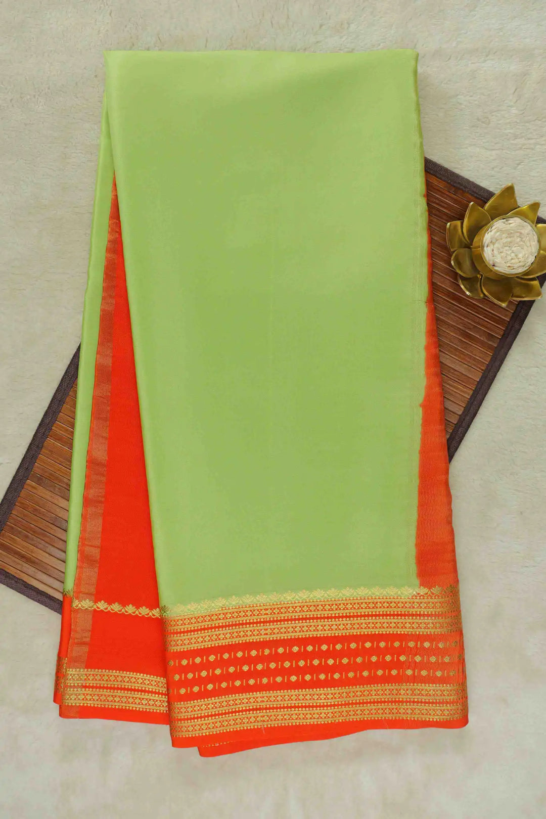 Light green Mysore Silk Saree with orange pallu and gold border