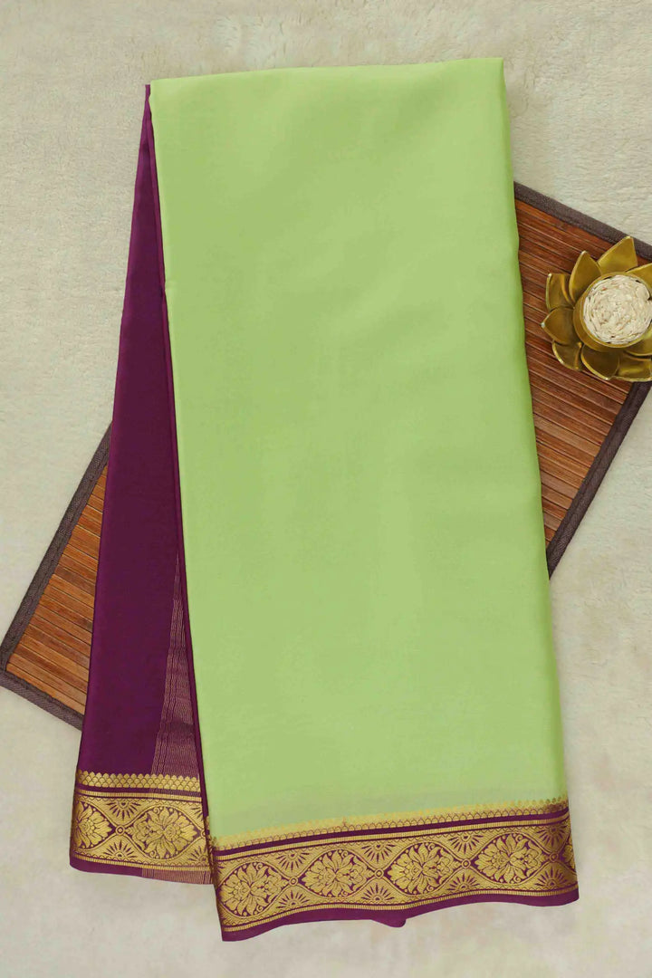 Light green Mysore Silk Saree with purple pallu and gold border
