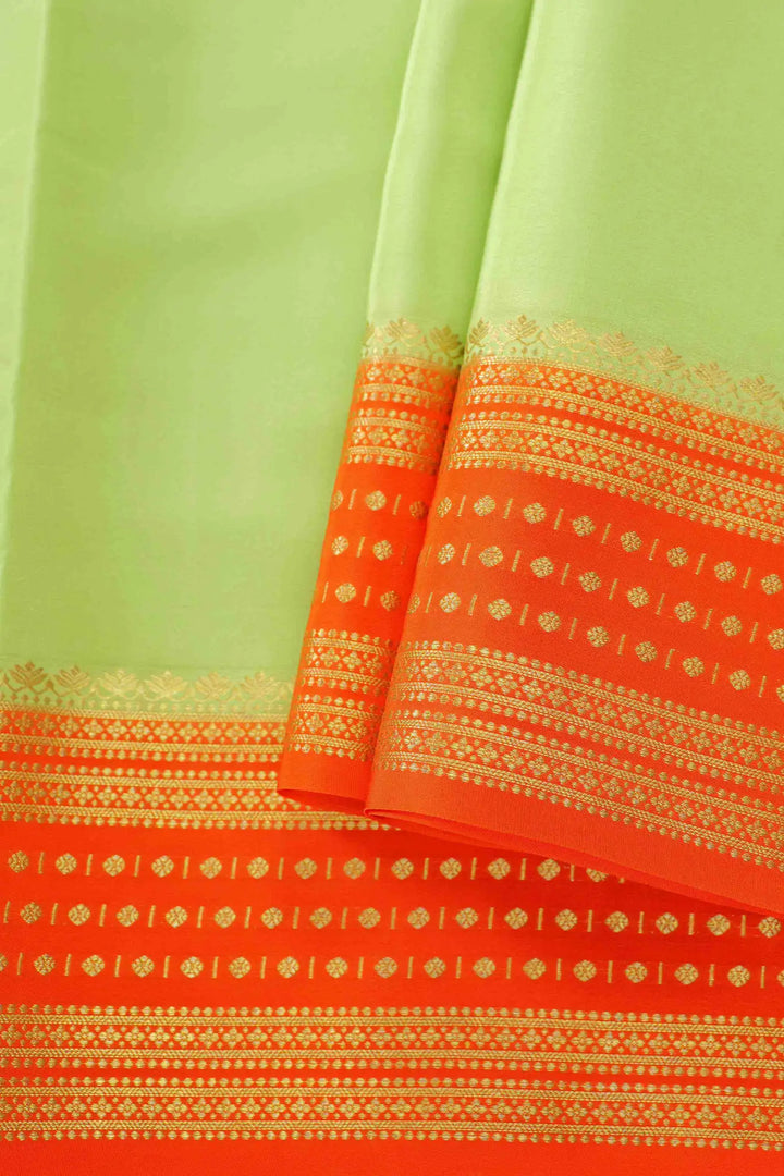 Light green and orange Mysore Silk Saree with gold detailing