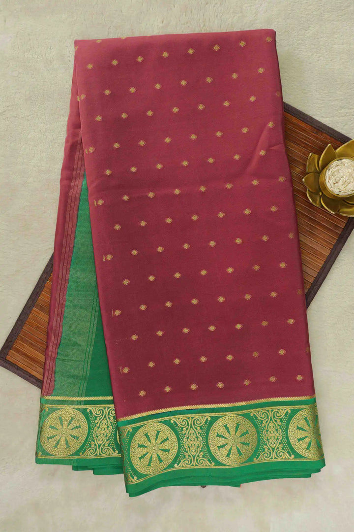 Maroon Mysore Silk Saree with a green golden border pattern
