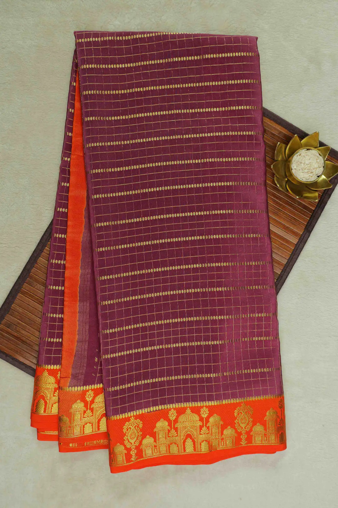 Maroon Mysore Silk Saree with gold stripes and an orange temple border