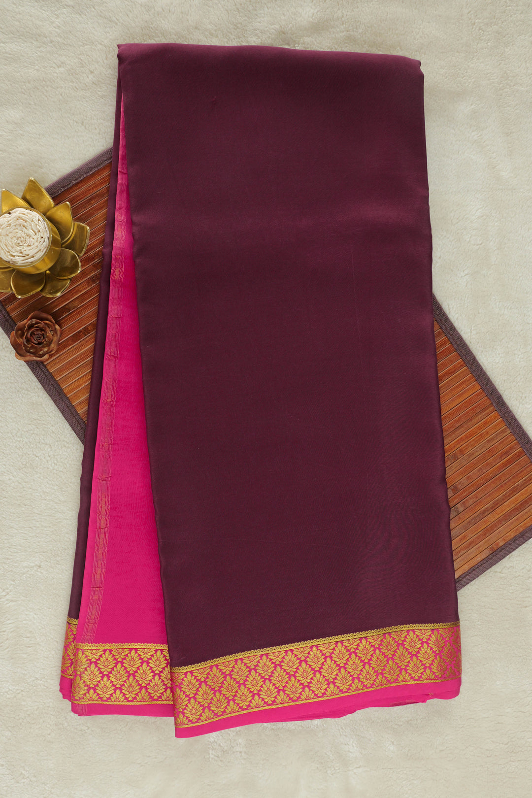 Maroon Mysore silk saree with pink border and golden zari work